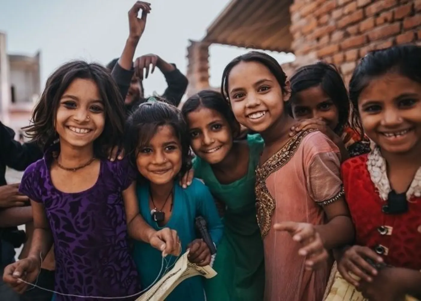 Group of smiling girls together in their village